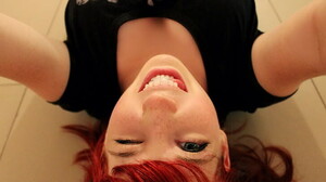 redhead-lying-down-dyed-hair-freckles-blue-eyes-tongues-black-clothing-women-winking-selfies-wallpaper-preview.jpg