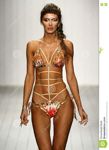 56578733_goddessmodel-walks-runway-designer-swim-apparel-liliana-montoya-fashion-show-miami-fl-july-miami-week-july-73057232.thumb.jpg.27e683793471d117fcd4bf79430b6b3c.jpg