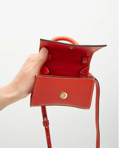 the-x-pomelo-orange-leather-mini-bag-handbags-alohas-264311_1900x.thumb.webp.64b87cf56af7e36291f885cecfaf6d99.webp