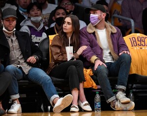 lily-collins-at-golden-state-warriors-vs.-la-lakers-game-at-staples-center-10-19-2021-1.jpg
