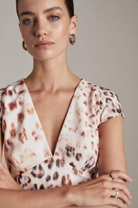 petite-figure-form-leopard-plunge-woven-top-2.jpeg