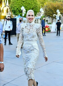 gwen-stefani-wears-snowy-white-lace-dress-filming-a-christmas-special-at-disneyland-11-19-2021-8.jpg
