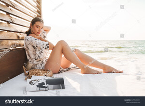 stock-photo-image-of-pleased-gorgeous-cheery-young-beautiful-woman-at-the-beach-in-a-beautiful-sunny-morning-1477678991.jpg