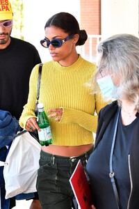 tina-kunakey-in-a-yellow-crop-top-at-marco-polo-in-venice-09-02-2021-1.jpg
