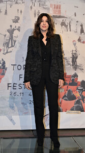 Monica Bellucci poses during a photocall for the 39th edition of the Torino Film Festival  2021 03.jpg