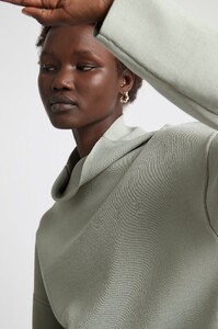 S16-20AJ1141_Psychedelia_Turtleneck_Crepe_Logo_Crop_DustySage-21540-Aje-1321_detailshot.jpeg