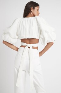 S84-20RE1295_Impression_Puff_Sleeve_Cut_Out_Top_Ivory-21877-Aje-1543.jpeg