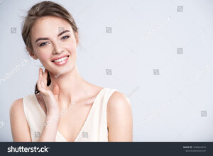 stock-photo-portrait-of-a-smiling-young-woman-with-a-brown-hair-beautiful-young-female-model-with-healthy-1583664919.jpg