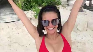 nina_dobrev_red_bikini_dance_beach1.jpg