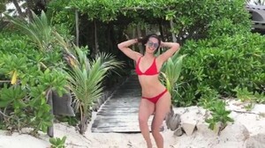 nina_dobrev_red_bikini_dance_beach2.jpg