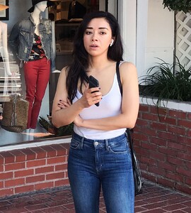 Aimee-Garcia-in-a-white-tank-top-and-denim-jeans--02.jpg