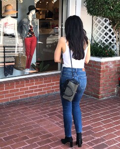 Aimee-Garcia-in-a-white-tank-top-and-denim-jeans--03.jpg