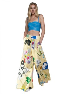monse-floral-wide-leg-trousers-in-butter-floral-on-model-walking-no-background-front-view.jpg