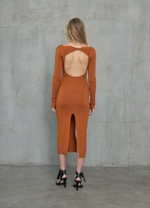 monse-long-sleeve-cut-out-knit-dress-rust-on-model-back-view.jpg