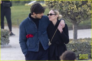 candice-swanepoel-paris-stroll-with-andres-velencoso-32.jpg