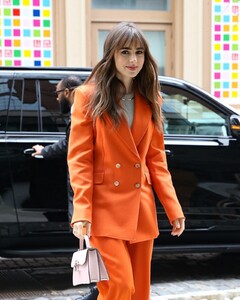 lily-collins-in-a-fashionable-red-pantsuit-new-york-03-23-2022-4.jpg