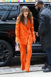 lily-collins-in-a-fashionable-red-pantsuit-new-york-03-23-2022-6.jpg