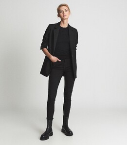 mid-rise-skinny-jeans-womens-lux-in-black-5.jpg