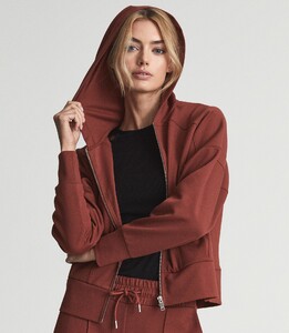 technical-jersey-zipped-hoodie-womens-nia-in-rust-red-7.jpg
