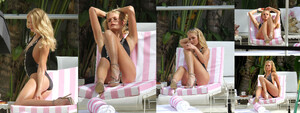 1416048359_ErinHeatherton-VictoriasSecretPhotoshoot@MiamiBeach2012_09.10BlackMQ04.thumb.jpg.4635861e28bbd0a48aaea0c166c1e053.jpg