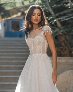 bianco.dresses_263845809_3063910820544488_6730227687000032954_n.jpg