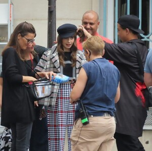 lily-collins-and-lucas-bravo-emily-in-paris-set-in-paris-08-24-2022-1.jpg