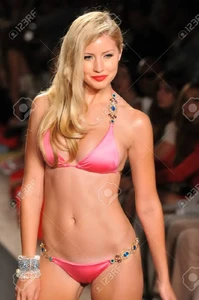 18536331-miami-july-14-model-walks-runway-at-the-beach-bunny-swimsuit-collection-for-spring-summer-2012-durin.thumb.webp.fd649530f14f8c2a64d9c3d12e06ef38.webp