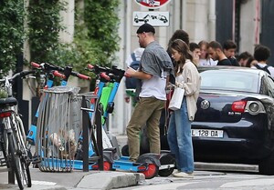lily-collins-and-charlie-mcdowell-out-for-a-scooter-ride-in-paris-09-15-2022-2.jpg
