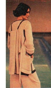 Lisa Crosby. Design zealot, Sonia Rykiel advises you to hang your additional cardigan on your back shoulder strap..jpg