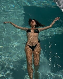 Emily_Feld_In_Bikini_in_the_Pool_12_20_2022.jpg