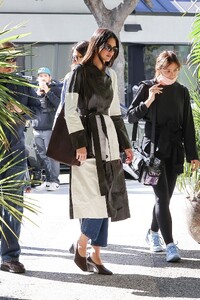 kendall-jenner-in-a-black-and-white-leather-trench-coat-los-angeles-11-17-2022-0.jpg