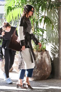 kendall-jenner-in-a-black-and-white-leather-trench-coat-los-angeles-11-17-2022-1.jpg
