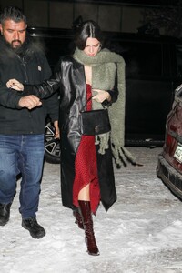 kendall-jenner-in-a-red-dress-and-a-black-leather-coat-aspen-12-29-2022-2.jpg