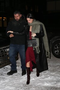 kendall-jenner-in-a-red-dress-and-a-black-leather-coat-aspen-12-29-2022-3.jpg