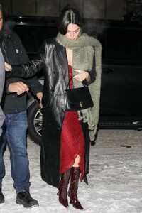 kendall-jenner-in-a-red-dress-and-a-black-leather-coat-aspen-12-29-2022-5.jpg