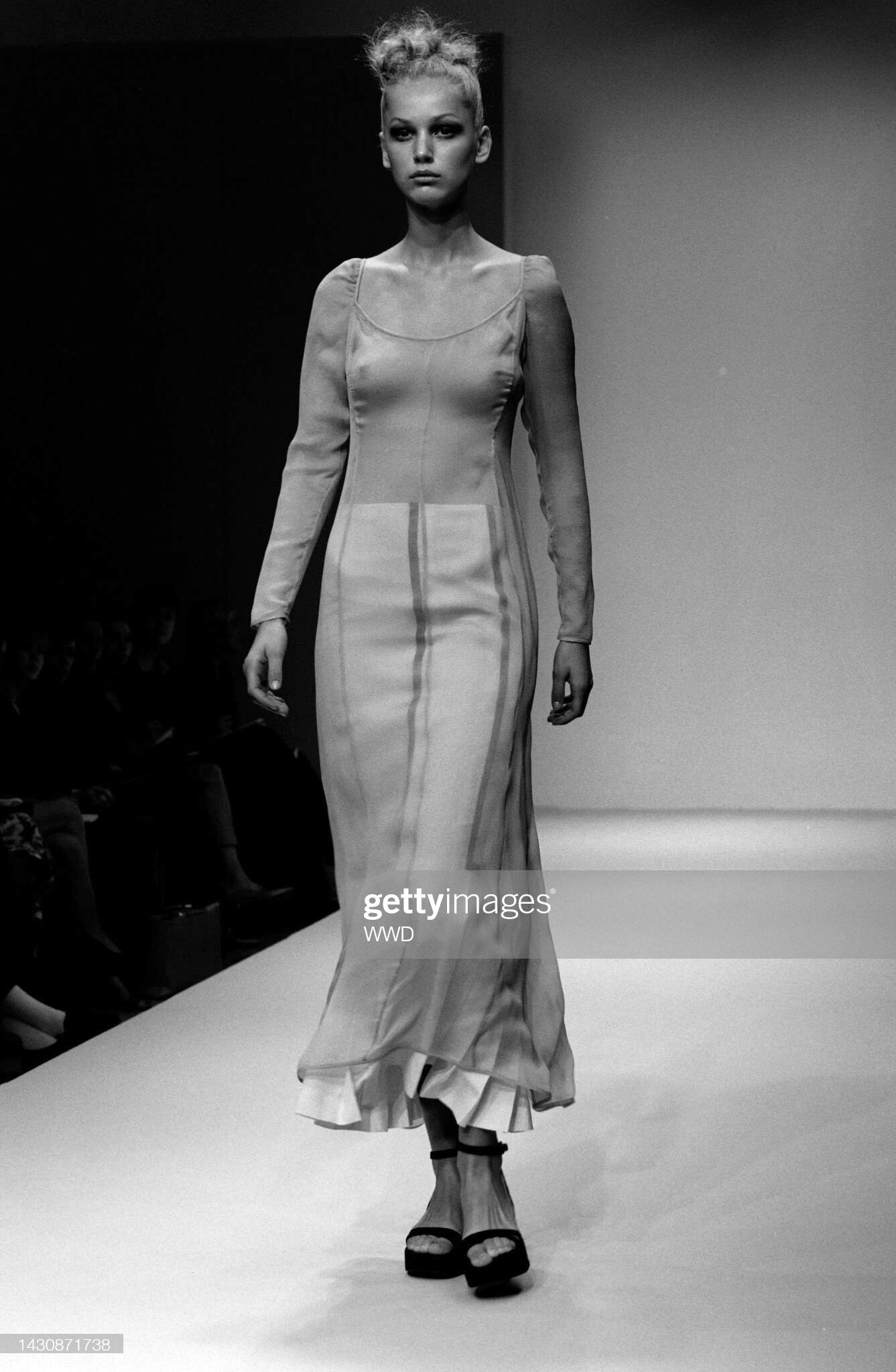 A model walks in the Louis Feraud Spring 1999 Couture Runway Show
