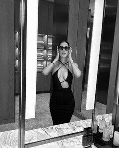 Iris_Mittenaere_in_black_Swimwear_and_black_Dress_01-29-2023__4_.jpg