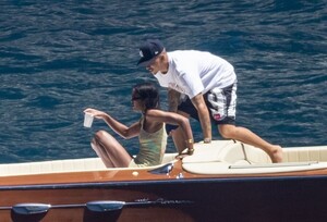 laura-harrier-in-bikini-and-sam-jarou-at-a-boat-in-positano-07-13-2022-0.jpg