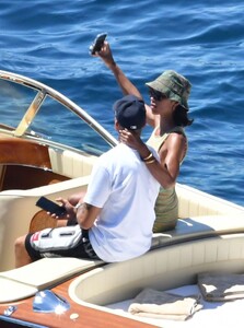 laura-harrier-in-bikini-and-sam-jarou-at-a-boat-in-positano-07-13-2022-2.jpg