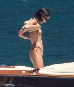 laura-harrier-in-bikini-and-sam-jarou-at-a-boat-in-positano-07-13-2022-5.jpg