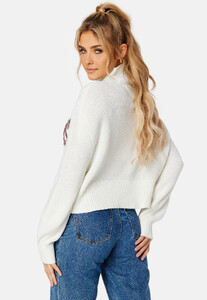 tommy-jeans-crop-college-cable-sweater-ybl-ecru_2.thumb.jpg.448c74f4f822f247f83a344426592e03.jpg