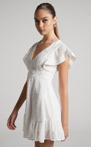 4_Once_Upon_A_Daydream_V_Neck_Mini_Dress_in_White_7.jpg