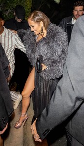 Jennifer-Lopez---Wears-slit-black-satin-dress-at-her-Revolve-Launch-Party-in-L.A-02.jpg