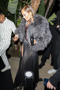 Jennifer-Lopez---Wears-slit-black-satin-dress-at-her-Revolve-Launch-Party-in-L.A-03.jpg