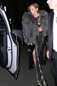 Jennifer-Lopez---Wears-slit-black-satin-dress-at-her-Revolve-Launch-Party-in-L.A-04.jpg