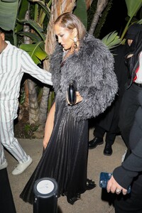 Jennifer-Lopez---Wears-slit-black-satin-dress-at-her-Revolve-Launch-Party-in-L.A-10.jpg