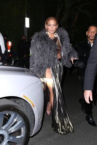 Jennifer-Lopez---Wears-slit-black-satin-dress-at-her-Revolve-Launch-Party-in-L.A-13.jpg