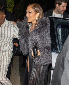 Jennifer-Lopez---Wears-slit-black-satin-dress-at-her-Revolve-Launch-Party-in-L.A-18.jpg