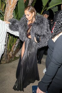 Jennifer-Lopez---Wears-slit-black-satin-dress-at-her-Revolve-Launch-Party-in-L.A-19.jpg