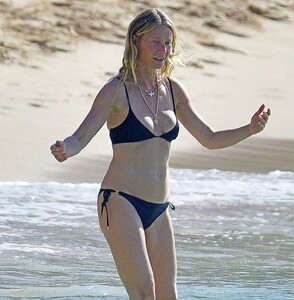 gwyneth-paltrow-and-apple-martin-in-bikinis-on-the-beach-in-bridgetown-12-27-2022-2.jpg